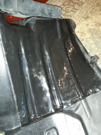 Damping material.easily conforms to the contours of fender liner. Apply in a smoothing motion working from one side to the other to avoid air pockets. If air is trapped, simply release by using a pick to pierce material.