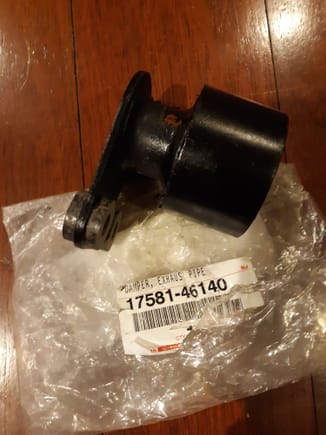 LS460 rear muffler exhaust damper # 17581-46140.  Notice fiber insulating washers (4) on both side of bracket.  Held in place with high temperature adhesive.