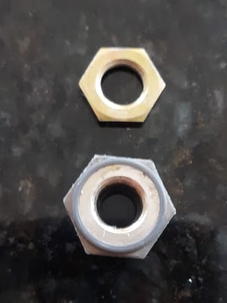 A side-by-side comparison of APM-Hexseal part and OEM.jamb nut.