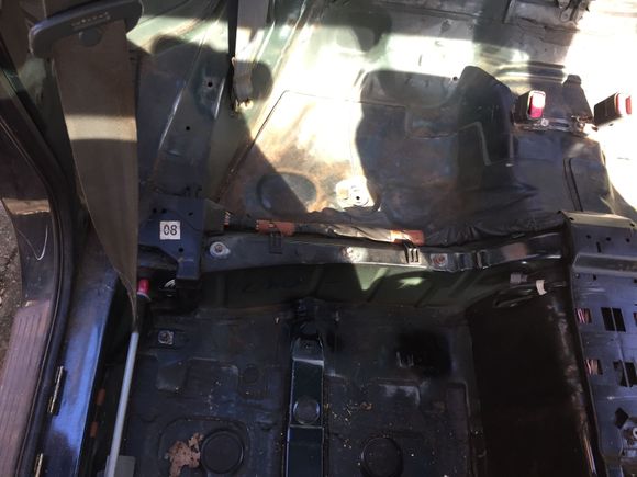 Floorboards rusted from leaking sunroof & windows.
