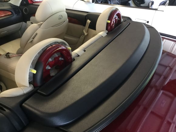 Remove the headrests, backseat etc to run wires to the trunk.