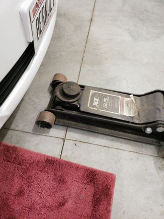 Floor Jack with hockey puck.