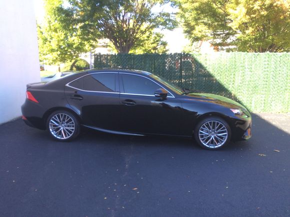 Before roof spoiler and wrapped window trim