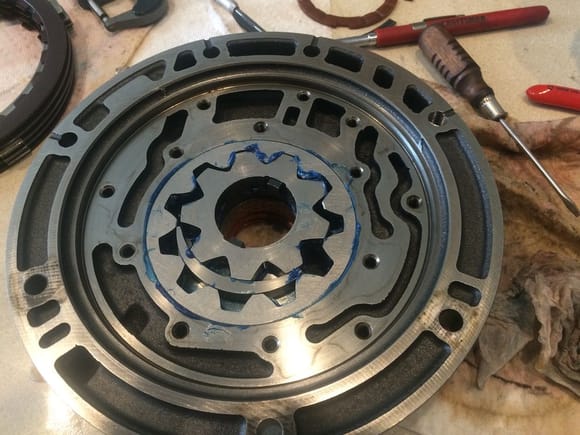 I put a small film of assembly grease on the rotors before assembling the pump. There is a dot on the inner and outer rotors and they both face down.
