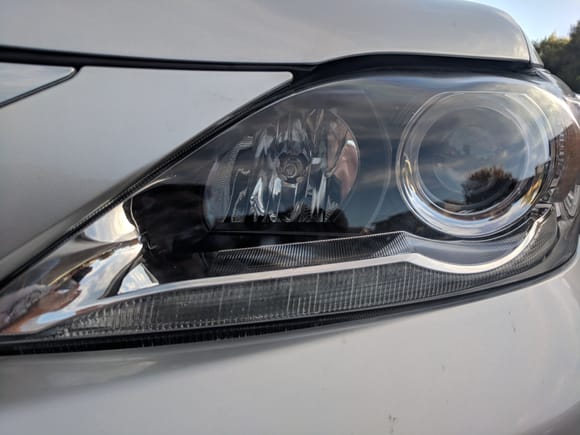 This is the CT200h OEM light housing.  Note the most outside one is the low beam which has the OEM "projector type" housing vs the high beam next to it to the left which has OEM "reflective type" housing.   Usually it's better to use "projector type" of housing for higher output bulbs such as the LEDs otherwise with the "reflective type housing" there will be too much scattering of light all over the place.
