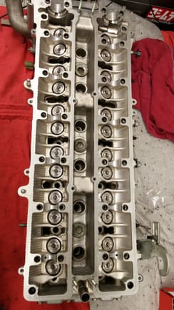 FINALLY ! ! ! ! ! !   ... After two days of slowly cleaning every valve, valve guide, valve seat, and runner port this sucker is completed.