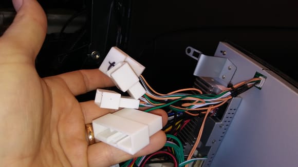 Side cord. The one with X is not connected to the car harness.
