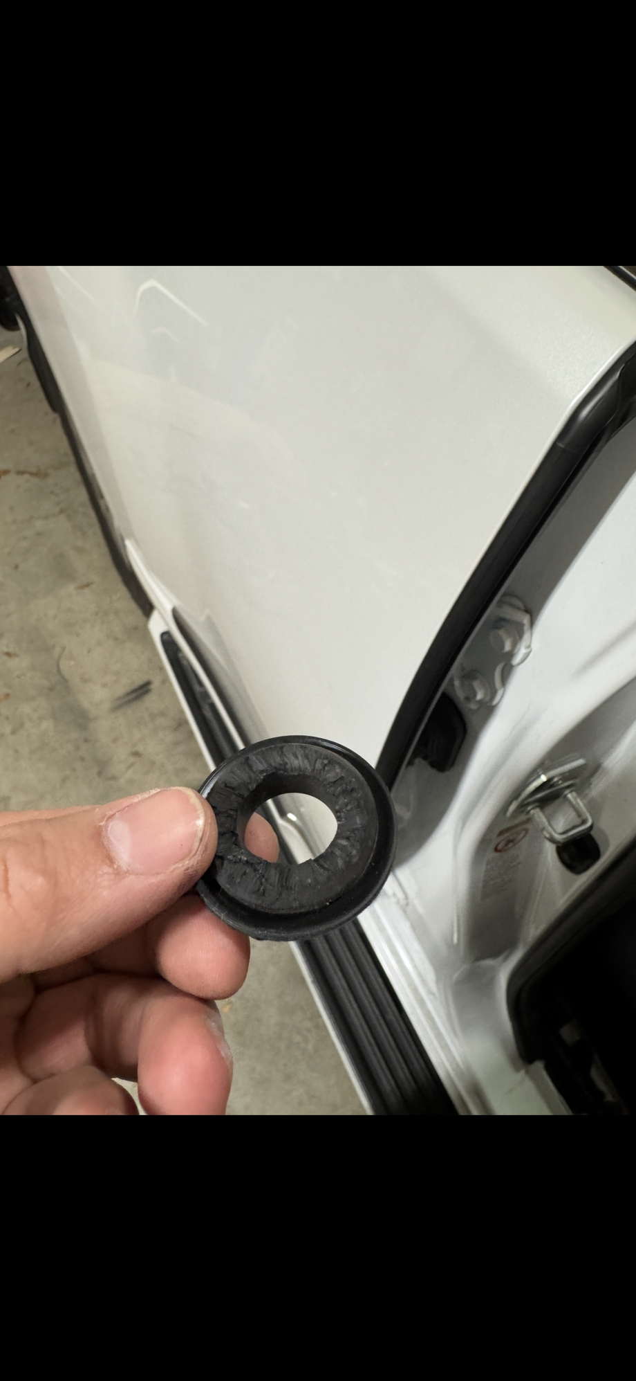 This was the grommet for the AC drain tube, does it look broken?