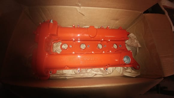 New powdered valve cover. Doesnt exactly match tial red like i asked but i like it anyway. Candyapple red with metal speckel in it