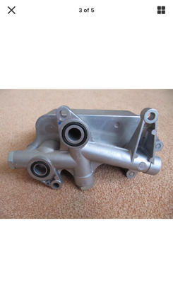 I figured out it is this oil cooler is what would go there.