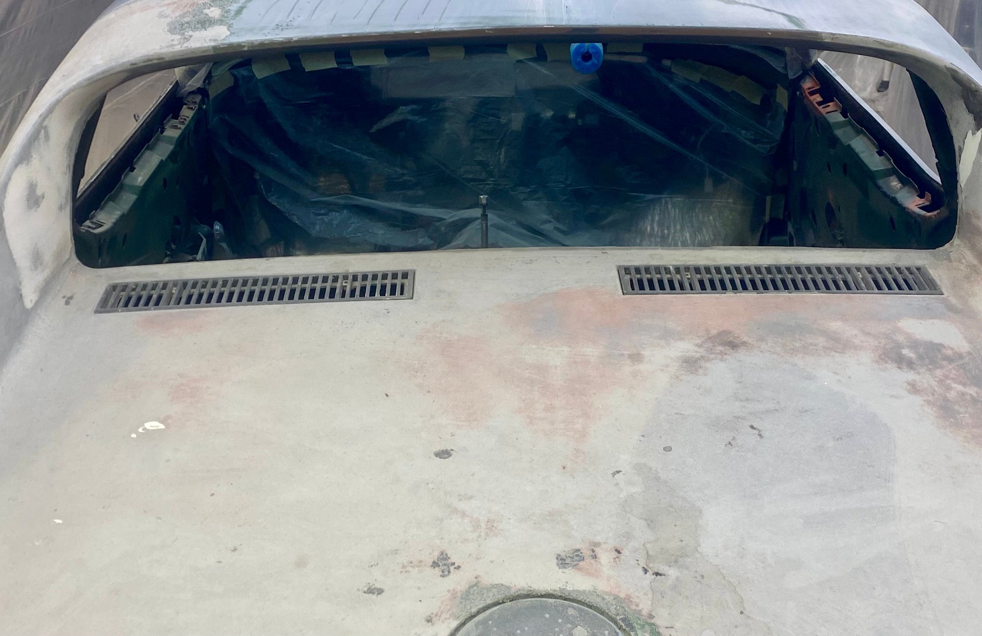 The obvious function to me would be to drain water from near the window. But was it such a problem that they required these massive drains to handle the water that wouldn�t pool unless you were parked downhill? On level ground water easily runs off since the panel has a few degrees of slope. 