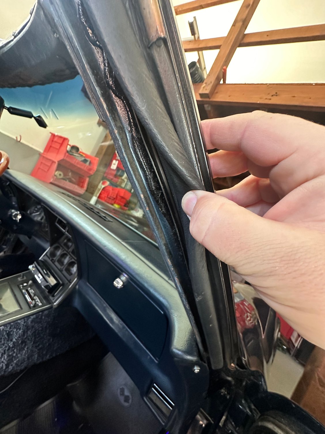 Pulled back the rubber on the windshield frame posts and looked good as far as I can see in there