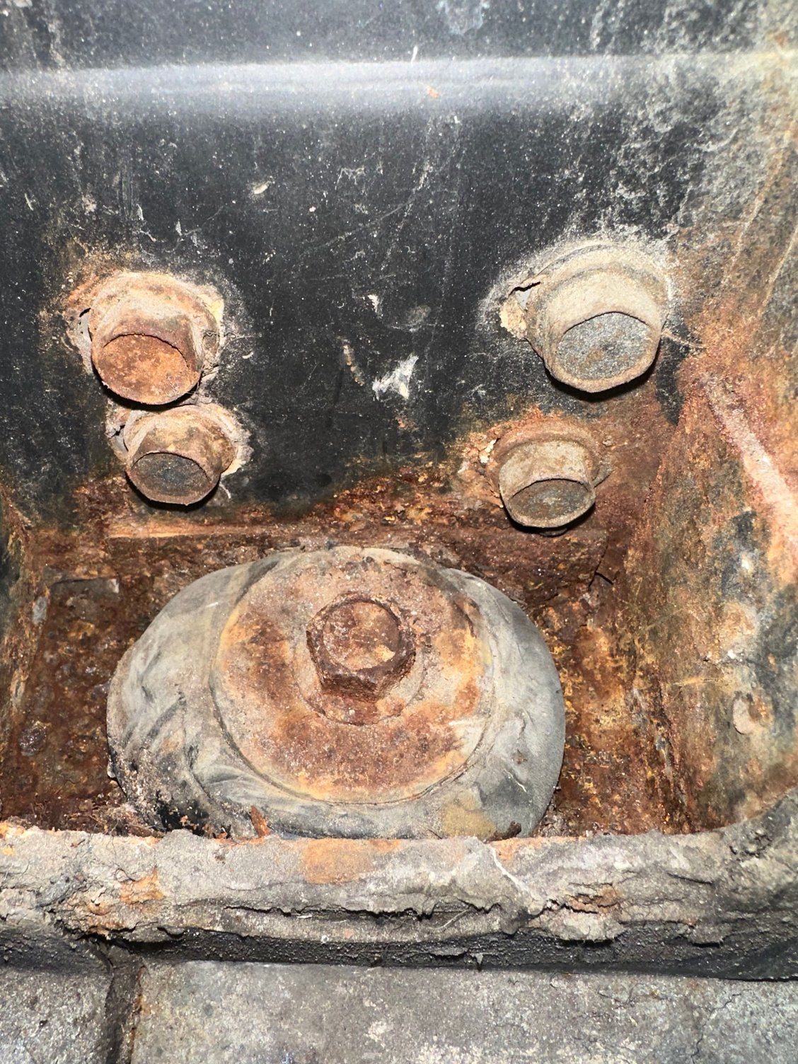 Driver side number 2. Rusted but not through the metall