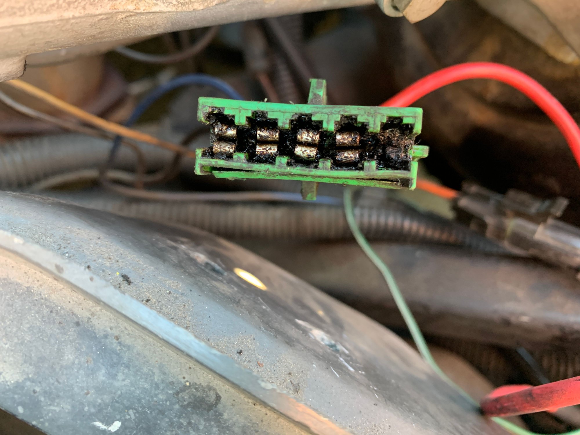 Some melted plastic from the old relay that I had to clean out.