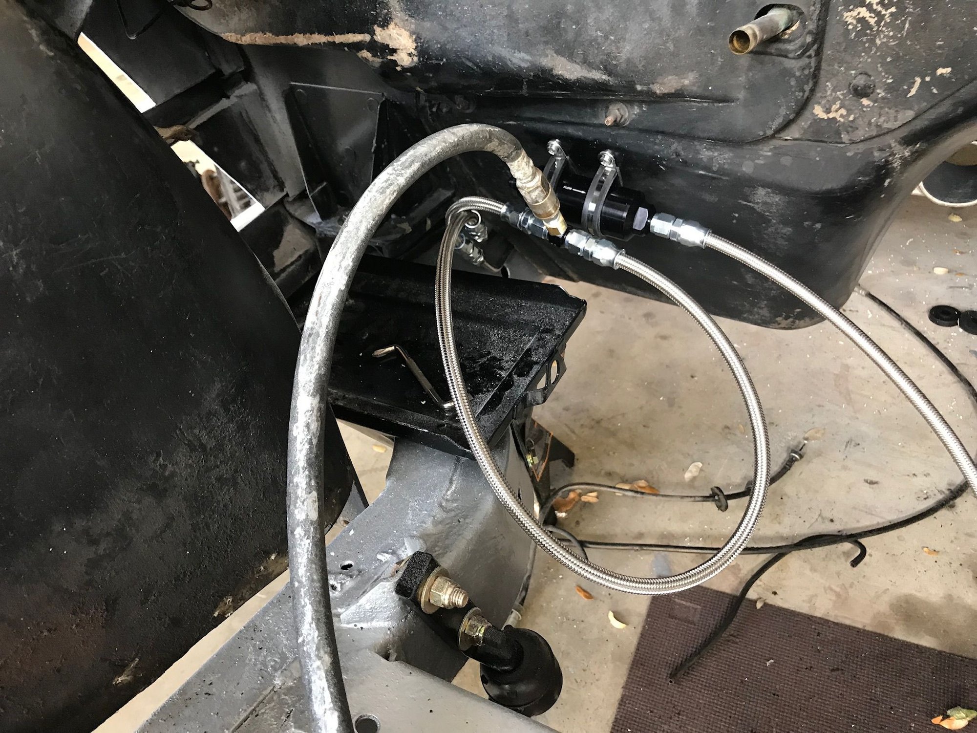 This was for pressure testing for leaks, but you can see where the lines enter the engine compartment. The supply goes through t 10 micron filter.