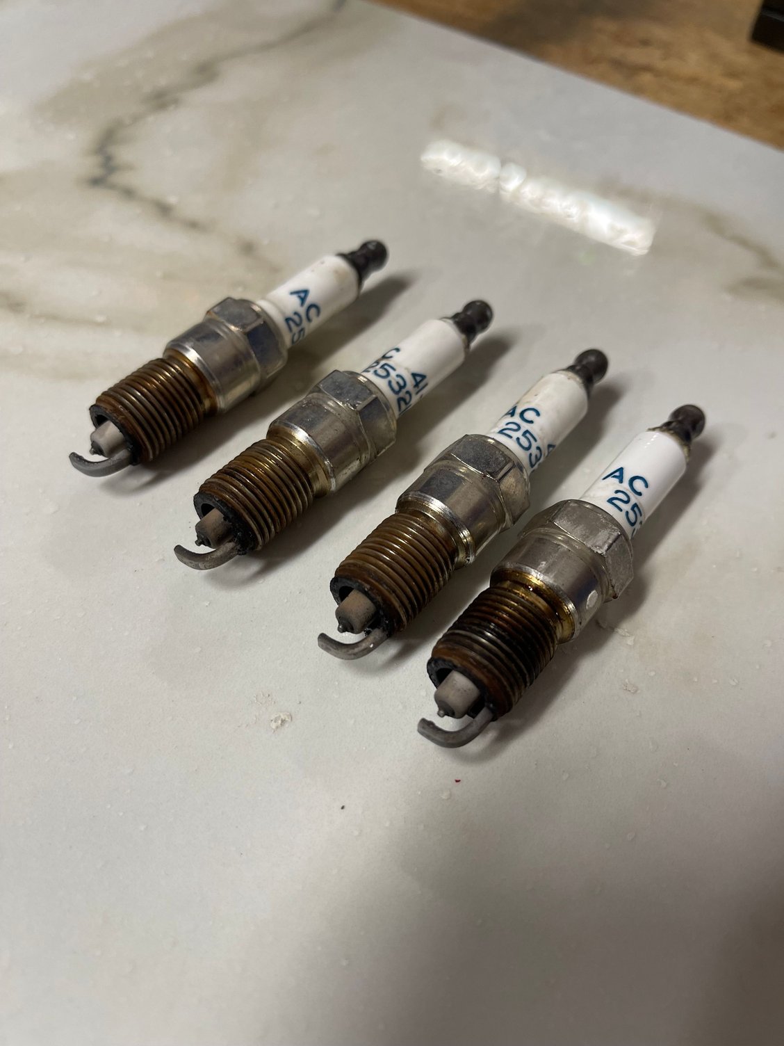 These are platinum AC plugs that have been in the car for at least 40k miles and 14 years, probably longer. I was surprised they were in such good shape. It appears they were gaped at .060 which was recommended at that time. Wires were also at least that old and could have been the originals. Done as preventative maintenance, but was hoping I would be able to tell a difference in drivability which was negligible. 