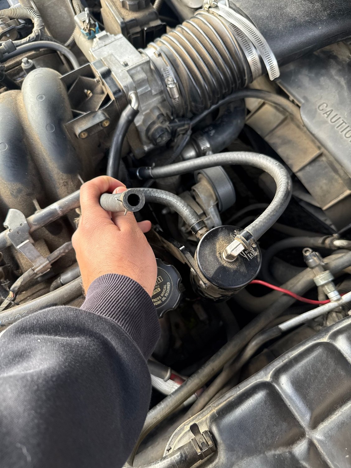 Looks like the catch can was not properly installed but I don�t know how to put it back together. 