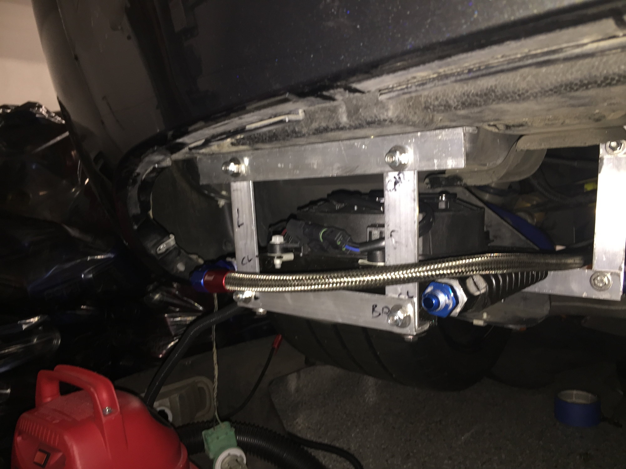 Cooler car under transmission mounting remote trans