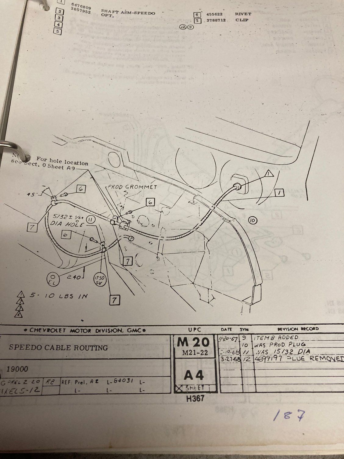 This appears to show the speedo cable coming from the passenger side running through the tranny tunnel, and coming up and going in from middle to enter the cabin.