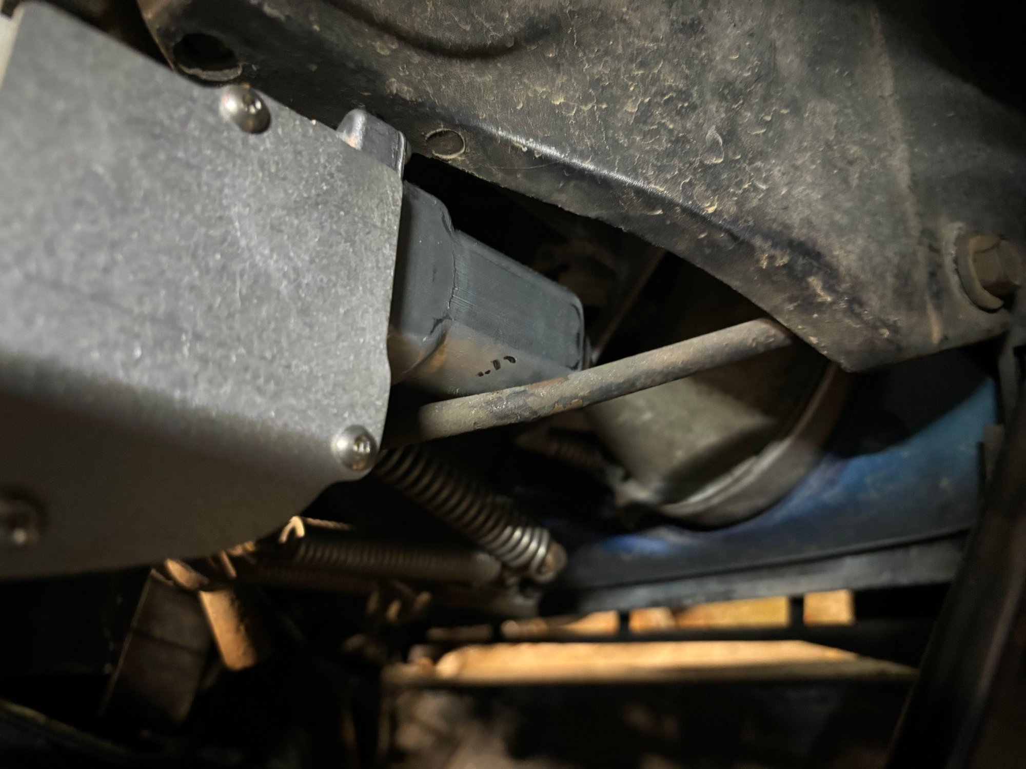 Instructions call for a slight bend if required of a support rod on the driver�s side.  I marked the area with a sharpie and gave it a slight bend� and was very surprised that I was spot on.  It clears the motor beautifully. 