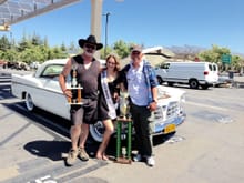 My friend John and I posing with Ms. Hollywood, trophy girl at large annual Mopar Alley event.