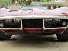 Another front view.  No license plate or rubber flap covering the headlights.