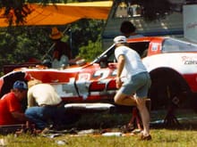 Ray Williams, Bob Klempel, and Dick Durant repairing a broken Corvette