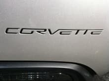 close up view of the black lettering added to my silver vette