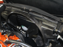Right side lines up with edge of hood hinge on hood. 1970