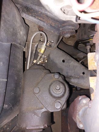 I disconnected the rear line at the distribution block and coupled it to a new line to the master cylinder. Then put a plug in the distribution block. I can easily revert back to the original master cylinder.