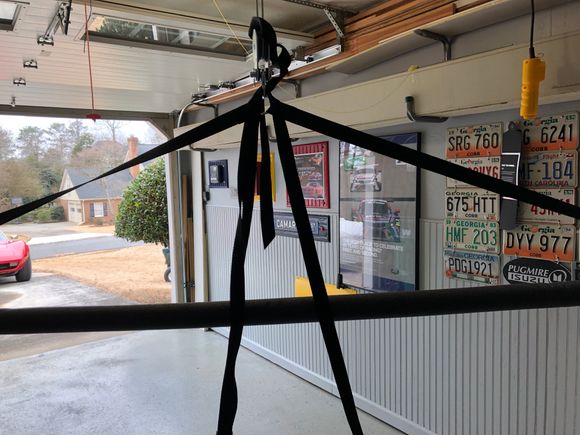Here a picture of the straps / arm the attaches to the hard top.  