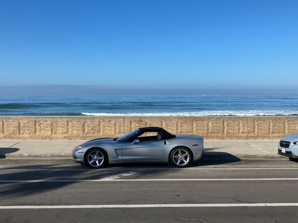 By the beach.