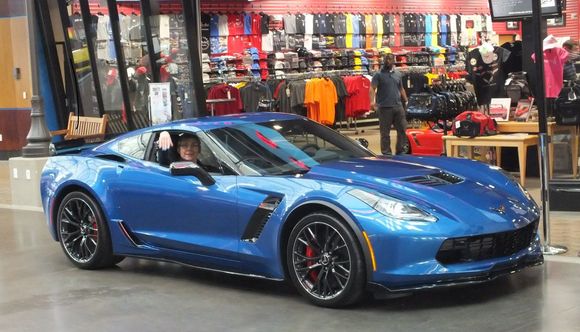 Museum Delivery with my wife showing off her matching Laguna Blue finger nail polish!! You can see the Spectra Gray wheels with machined stripe