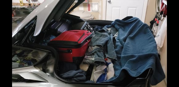 That's  my cargo area.. and i listed what i stowed in there.. 

I use  my vette as much as i can. Get over yourself 