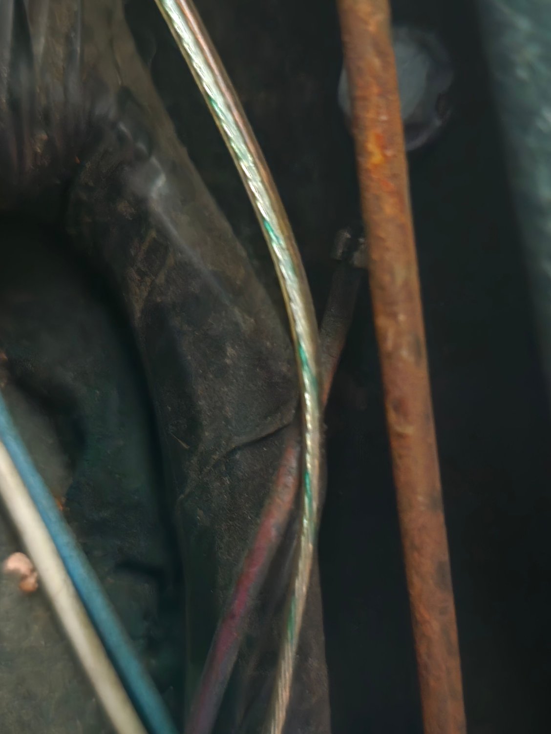 Ground wire in background. Drivers interior quarter panel trim removed.
