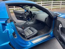 notice fully leather covered dash and doors. Navigation screen in center console.