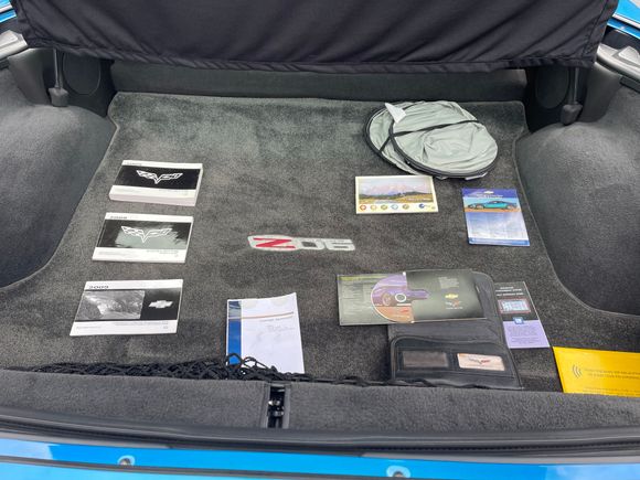 All GM provided documentation is provided with car. Notice cargo mat with Z06 logo.