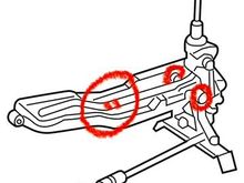 This familiar diagram of the shifter mechanism is marked in red to show where the "bushings" were installed.  