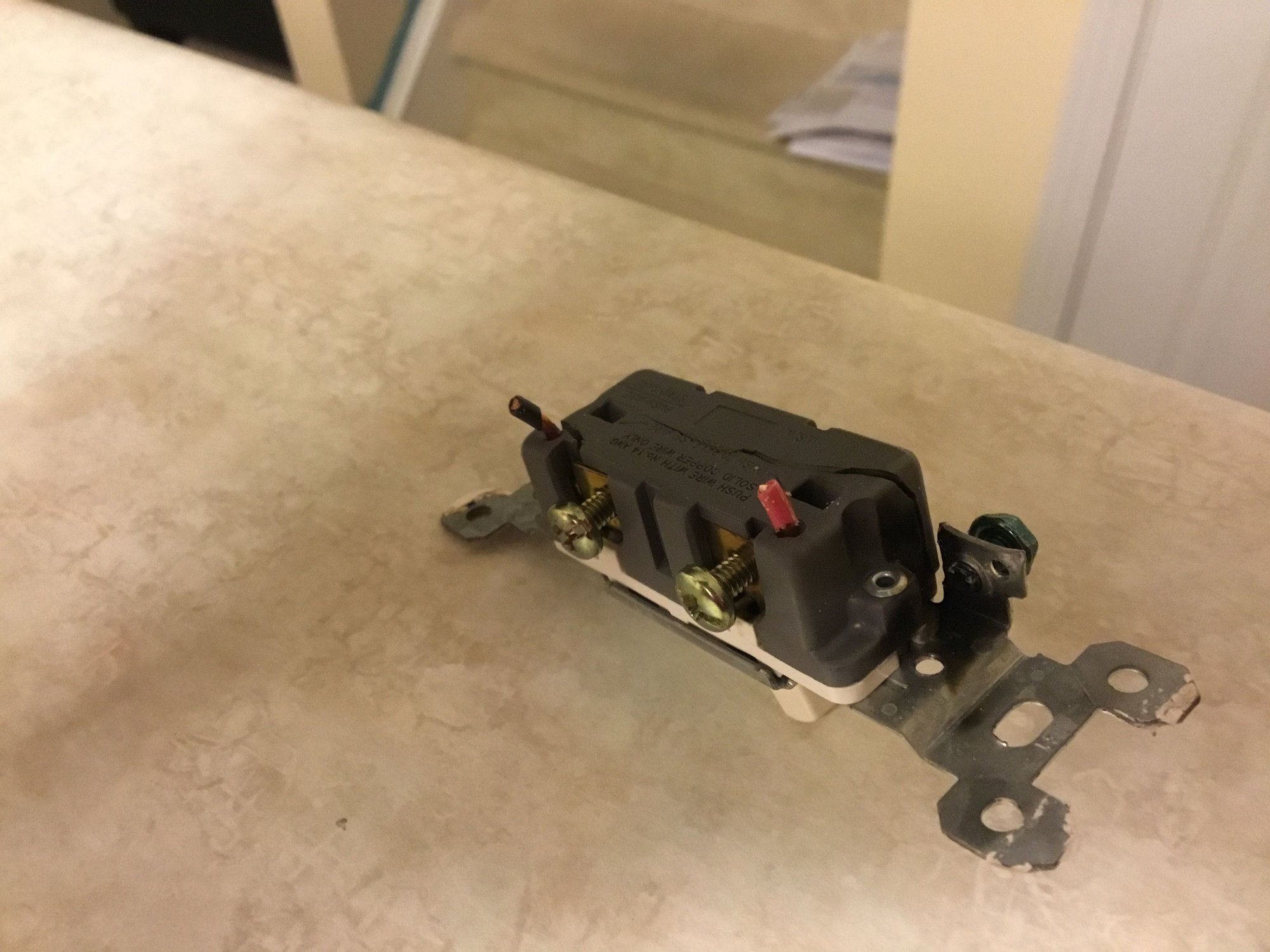 Failed light switch. Are the cracks the cause, or the result