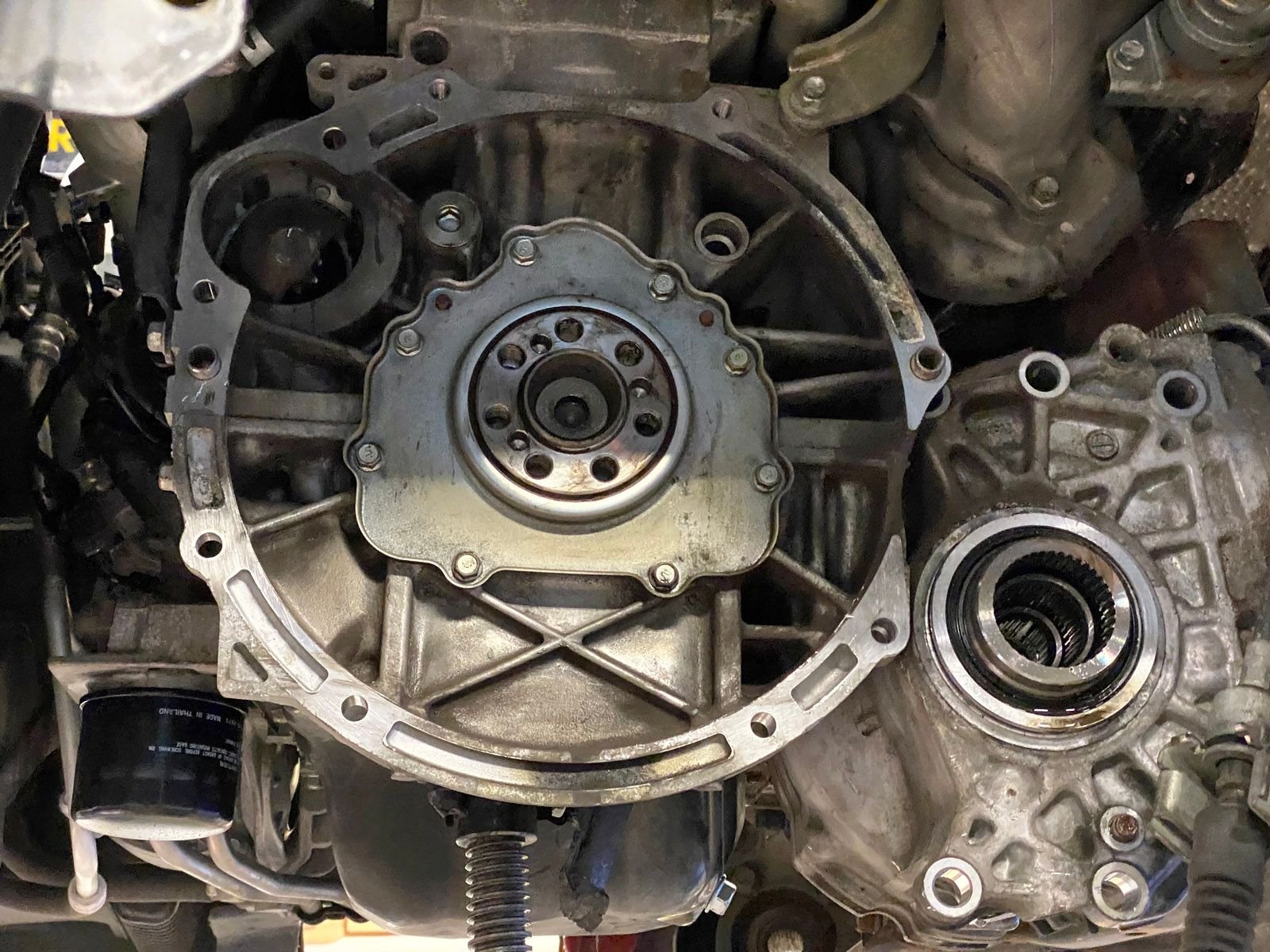 Mitsubishi Evo X transmission, clutch, and flywheel removed.