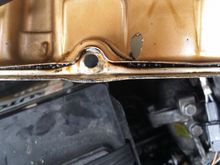 Can you see how disformed the area is around the bolt holes?  It's like that around all the holes