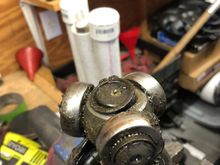 Remove snap ring from CV bearing body