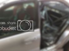 Removed rear drivers side door and back seats to begin Cusco cage install of the main hoop