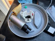 Stock fuel pump with sock removed from hanger