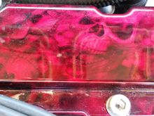 Shaved, and powder coated valve cover with hydrographics.
