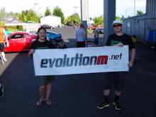 migs647 passing Darwin and the EvoM banner to BellyD