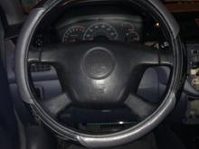 Steering wheel cover , but switching to the evo sterring wheel and gauge