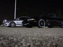 Sick night shot of my buddys 96 Talon TSI and my Evo