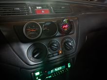 The old autometer is just halfa$$in it in there for now. Ironically the AEM fit better into the Autometer pod than the Autometer gauge.
