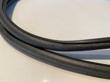 ^Close-in shot of the 10-years-old Evo X sunroof weather strip. It has tears and has lose elasticity.
